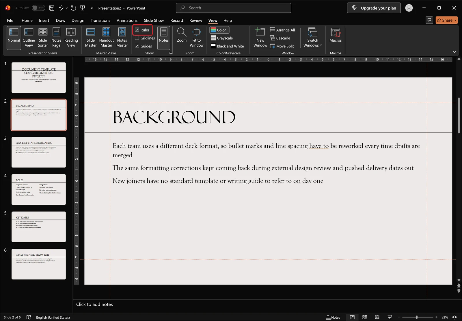 PowerPoint View tab with the Ruler checkbox turned on, showing a horizontal ruler above the slide and a vertical ruler at its left, both displaying only the numeric scale with no text in edit mode