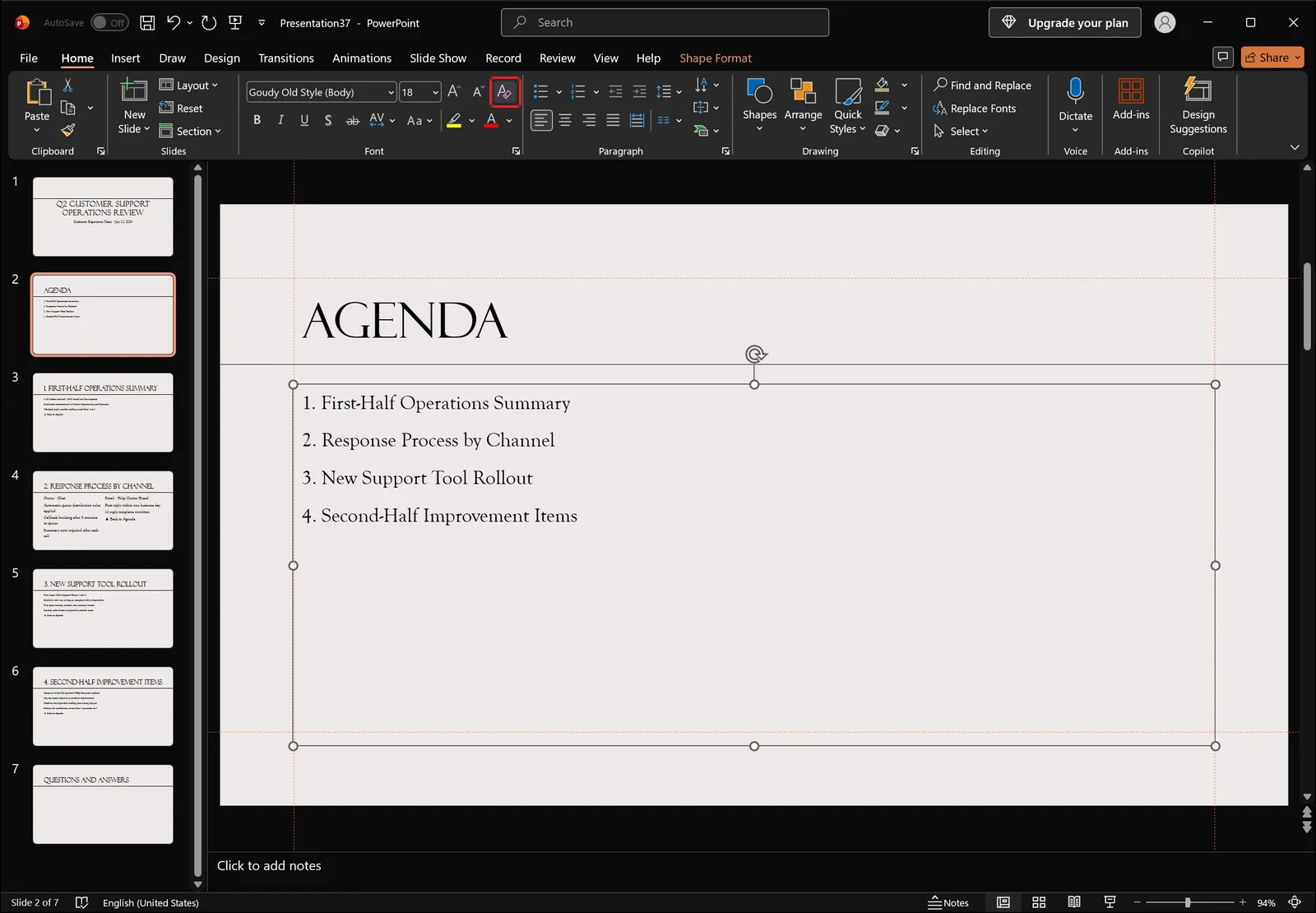 PowerPoint after clicking Clear All Formatting so the agenda text shows plain default styling, red box on the button