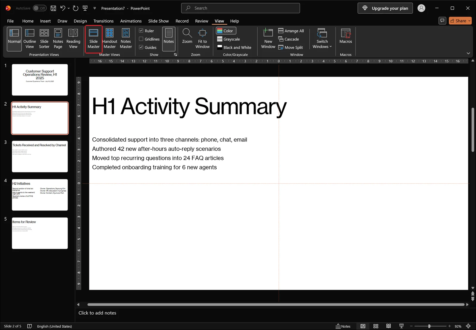 PowerPoint window with the View tab active and a red box highlighting the Slide Master button in the Master Views group.