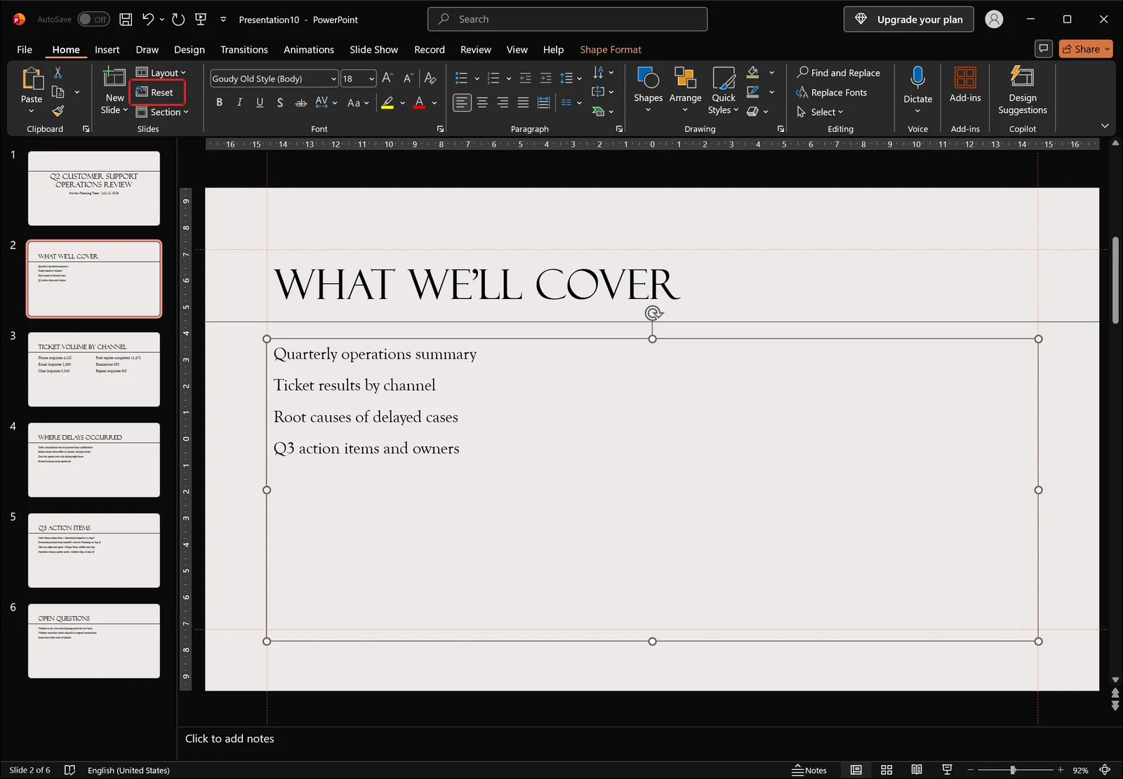 PowerPoint Home tab with a selected placeholder on the slide and a red box highlighting the Reset button in the Slides group.